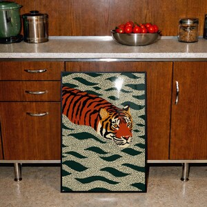 Stylized tiger illustration moving through abstract green wave patterns with dotted textures on a neutral background. The bold orange and black striped tiger contrasts with the rhythmic organic shapes, creating a dynamic maximalist composition. Hand drawn details and modern folk art influences give the artwork a playful yet powerful visual identity. Perfect for living room wall decor, kids room styling, eclectic interiors, or jungle themed spaces seeking a bold statement animal artwork.