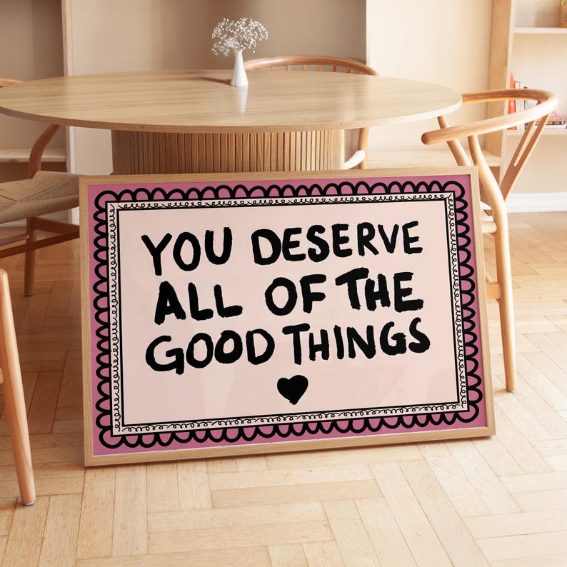 A heartwarming affirmation poster featuring the phrase You Deserve All Of The Good Things in hand-lettered black text with a pink and cream border. Perfect for self-love decor, home offices, or as a thoughtful gift. This piece adds positivity, encouragement, and warmth to any wall.You Deserve Poster, Self Love Wall Art, Positive Quote Print, Motivational Home Art, Pink Modern Poster, Inspirational Typography, Empowering Print, Daily Affirmation Art, Encouraging Quote, Feminine Room Print