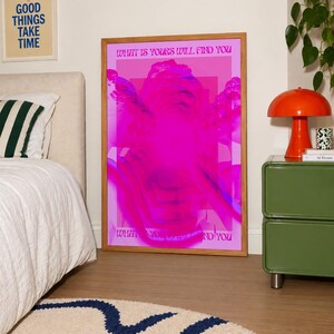 This pink glitch art print layers Greek and Roman statue busts in neon magenta, framed by retro typography and the phrase “What Is Yours Will Find You.” Repeated figures and digital distortion create a bold vaporwave collage with a surreal mood. Made to command attention in a bedroom, living room, studio or maximalist gallery wall, it adds electric color and bold attitude. A striking choice for collectors of classical sculpture, dopamine decor, Y2K graphics and uplifting quote posters.