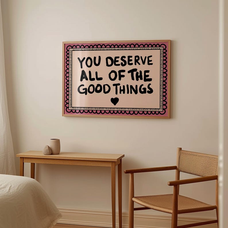 A heartwarming affirmation poster featuring the phrase You Deserve All Of The Good Things in hand-lettered black text with a pink and cream border. Perfect for self-love decor, home offices, or as a thoughtful gift. This piece adds positivity, encouragement, and warmth to any wall.You Deserve Poster, Self Love Wall Art, Positive Quote Print, Motivational Home Art, Pink Modern Poster, Inspirational Typography, Empowering Print, Daily Affirmation Art, Encouraging Quote, Feminine Room Print