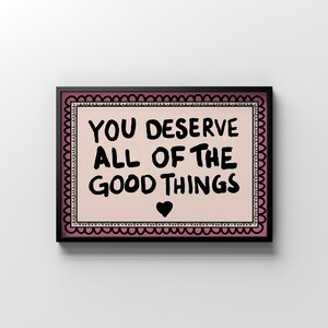 A heartwarming affirmation poster featuring the phrase You Deserve All Of The Good Things in hand-lettered black text with a pink and cream border. Perfect for self-love decor, home offices, or as a thoughtful gift. This piece adds positivity, encouragement, and warmth to any wall.You Deserve Poster, Self Love Wall Art, Positive Quote Print, Motivational Home Art, Pink Modern Poster, Inspirational Typography, Empowering Print, Daily Affirmation Art, Encouraging Quote, Feminine Room Print