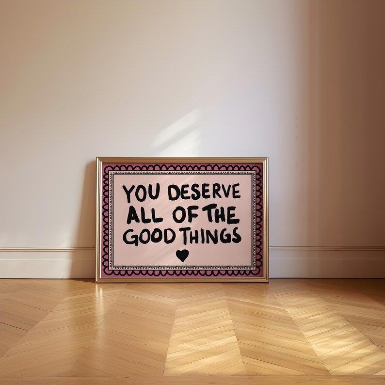 A heartwarming affirmation poster featuring the phrase You Deserve All Of The Good Things in hand-lettered black text with a pink and cream border. Perfect for self-love decor, home offices, or as a thoughtful gift. This piece adds positivity, encouragement, and warmth to any wall.You Deserve Poster, Self Love Wall Art, Positive Quote Print, Motivational Home Art, Pink Modern Poster, Inspirational Typography, Empowering Print, Daily Affirmation Art, Encouraging Quote, Feminine Room Print