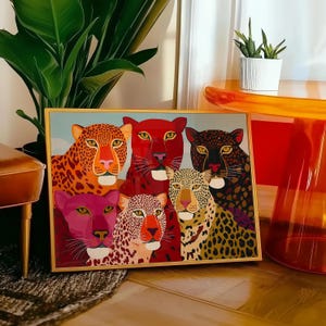 A vibrant maximalist illustration featuring a group of stylized leopards and panthers in bold red, orange, pink, and black tones. The artwork highlights expressive eyes, graphic patterns, and rich color contrasts, creating a striking statement piece inspired by modern folk art, dopamine decor, and eclectic interiors.Leopard Wall Art, Trendy Art Print, Big Cat Poster, Colorful Animal Art, Maximalist Decor, Wild Cat Design, Eclectic Home Art, Modern Folk Style, Red Aesthetic Poster, Dopamine Decor