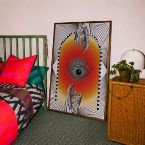 All seeing eye poster featuring a surreal central eye, chrome hands, black-and-white optical lines and a fiery orange gradient in a psychedelic collage style. Display this trippy art print in a living room, bedroom, studio, dorm or eclectic gallery wall to create a bold focal point with graphic movement and retro energy. Designed for collectors of surrealism, optical art and unconventional interiors who enjoy mysterious symbolism, vivid color and artwork that immediately starts a conversation.