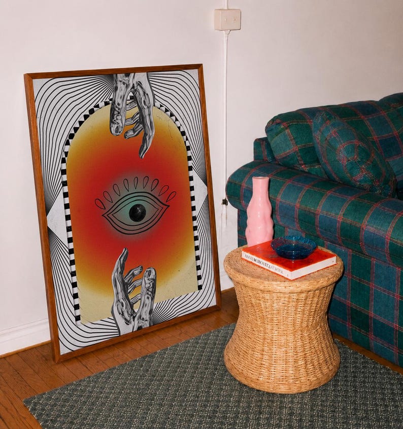 All seeing eye poster featuring a surreal central eye, chrome hands, black-and-white optical lines and a fiery orange gradient in a psychedelic collage style. Display this trippy art print in a living room, bedroom, studio, dorm or eclectic gallery wall to create a bold focal point with graphic movement and retro energy. Designed for collectors of surrealism, optical art and unconventional interiors who enjoy mysterious symbolism, vivid color and artwork that immediately starts a conversation.