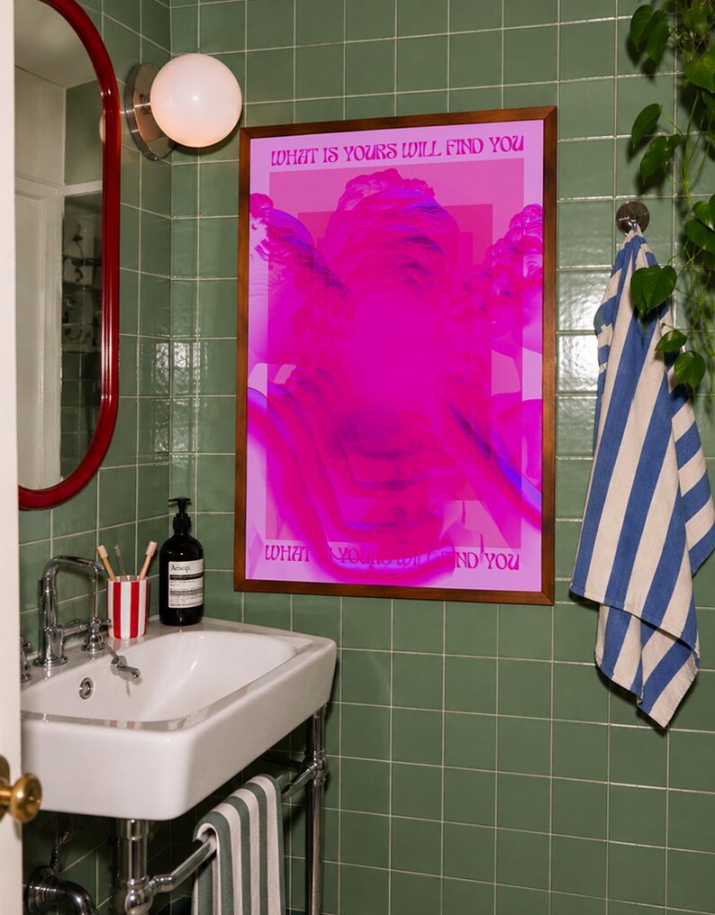 This pink glitch art print layers Greek and Roman statue busts in neon magenta, framed by retro typography and the phrase “What Is Yours Will Find You.” Repeated figures and digital distortion create a bold vaporwave collage with a surreal mood. Made to command attention in a bedroom, living room, studio or maximalist gallery wall, it adds electric color and bold attitude. A striking choice for collectors of classical sculpture, dopamine decor, Y2K graphics and uplifting quote posters.