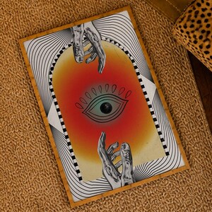 All seeing eye poster featuring a surreal central eye, chrome hands, black-and-white optical lines and a fiery orange gradient in a psychedelic collage style. Display this trippy art print in a living room, bedroom, studio, dorm or eclectic gallery wall to create a bold focal point with graphic movement and retro energy. Designed for collectors of surrealism, optical art and unconventional interiors who enjoy mysterious symbolism, vivid color and artwork that immediately starts a conversation.