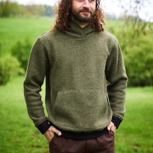 Sudadera con capucha 100% lana virgen "Modelo Luca", jersey con cierre de cremallera y bolsillo tipo canguro.