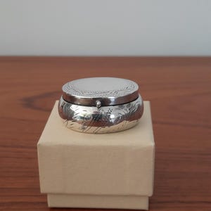 Tiny Sterling silver hall marked pill box, hinge lidded silver pot