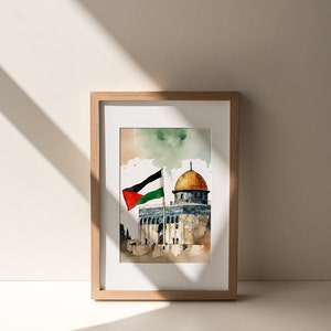 May include: A framed watercolor painting of the Dome of the Rock in Jerusalem, with a Palestinian flag waving in the wind. The painting is set against a light blue sky with white clouds.