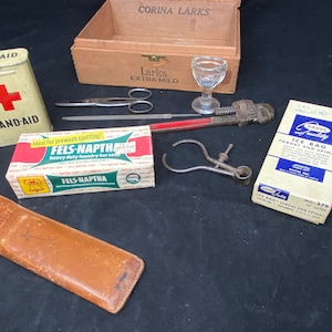 Vintage Medical Supply: Band-Aid, Davol Ice Bag, Fels-Naptha Laundry, Frederick Post Slide Ruler, Calipers - HUPPE Pipe Wrench, Metal file.
