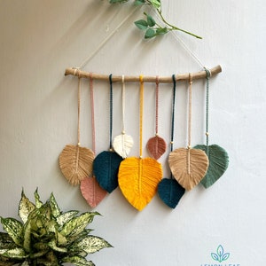 Decoração de parede com folhas de macramê boho: decoração colorida para berçário