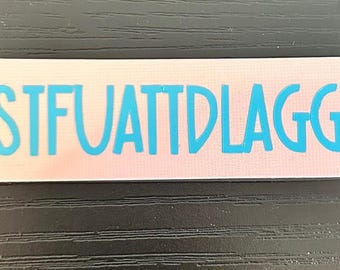 Magnetic Bookmark that says stfuattdlagg. Smutty bookmark.