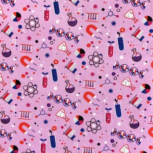 May include: A pink fabric with a repeating pattern of science-themed illustrations. The illustrations include beakers, test tubes, atoms, DNA strands, magnets, and other science symbols. The fabric is perfect for crafting projects, quilting, and other sewing projects.