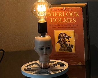 Doll head film reel lamp