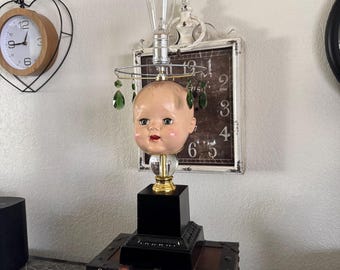 Tall doll head lamp with emerald green teardrop glass (30 IN.)