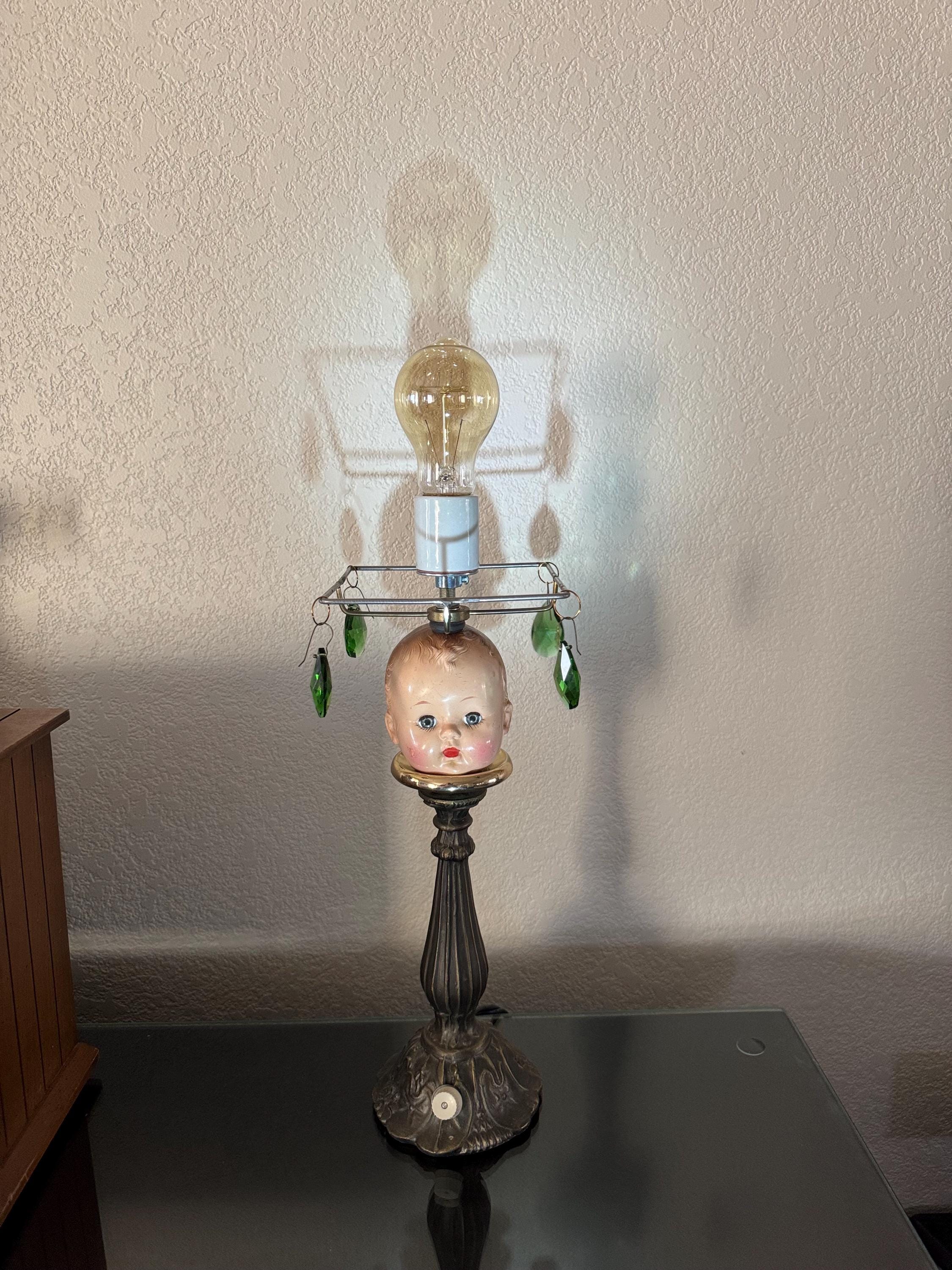 Metal doll head lamp with emerald green teardrop glass (19 IN.)