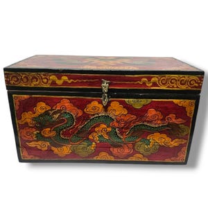 May include: A wooden box with a hinged lid and a brass latch. The box is painted with a red, yellow, and green dragon design.