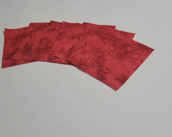 Scarlet Splendor: A Charm Pack of Red Marble Fabrics