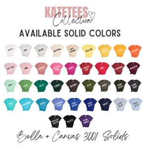 以下が含まれることがあります： Bella + Canvas 3001 の無地Tシャツカラーオプションのチャート。チャートには、白、黒、赤、青、緑、黄、ピンクなど、36 色の異なる色が表示されています。