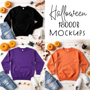 May include: A mockup featuring three crewneck sweatshirts in black, purple, and orange, with jeans, white sneakers, pumpkins, and Halloween decorations. The text "Halloween 18000B MOCKUPS" is displayed in the upper right corner.