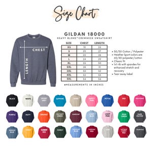 May include: Size chart for Gildan 18000 heavy blend crewneck sweatshirts. The chart shows chest and length measurements in inches for sizes XS to 5XL. The chart also includes information about the fabric composition and fit of the sweatshirts.