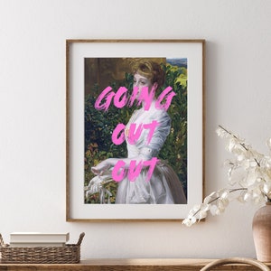 May include: A framed print of a woman in a white dress standing in a garden. The text "GOING OUT OUT" is written in pink over the image.