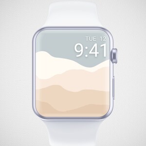 May include: A white smartwatch with a rectangular screen displaying the time, 9:41, and the date, Tue 12. The screen features a minimalist landscape design in shades of gray and beige. The watch has a white band and a silver-colored frame.
