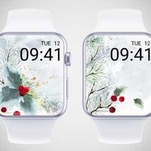 May include: Two white smartwatches with Christmas-themed watch faces. One features holly and red berries, the other pine branches and berries. Both displays show the time 09:41 and the date, Tuesday the 12th.