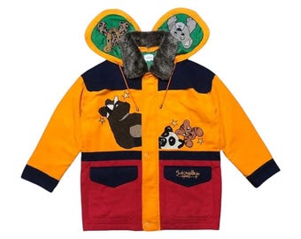 Chaqueta con capucha y cremallera de piel sintética con bloques de colores deportivos vintage Jean Charles De Castelbajac, bordada y estampada.