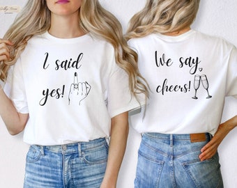 JGA Bride & Team T-Shirts vorne oder hinten bedruckt für Frauen, „I said Yes we say cheers“-T-Shirts, minimalistisches „Team Bride“-T-Shirt, Junggesellinnenabschieds-Shirt