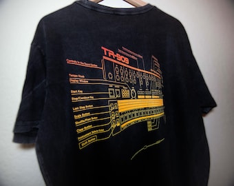 Música House / Caja de ritmos TR-909 / Regalo para productor musical y DJ. Camiseta unisex de algodón 100 % de alta calidad. Color negro.