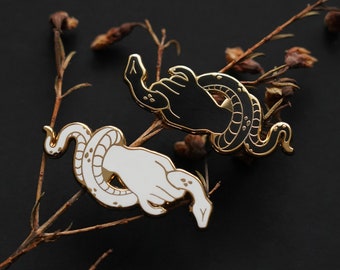 Snake hand mourning enamel pin