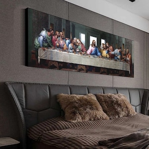 May include: A framed painting depicting The Last Supper, a famous Renaissance artwork by Leonardo da Vinci. The painting features Jesus Christ and his disciples gathered around a table, with a detailed depiction of their expressions and gestures.