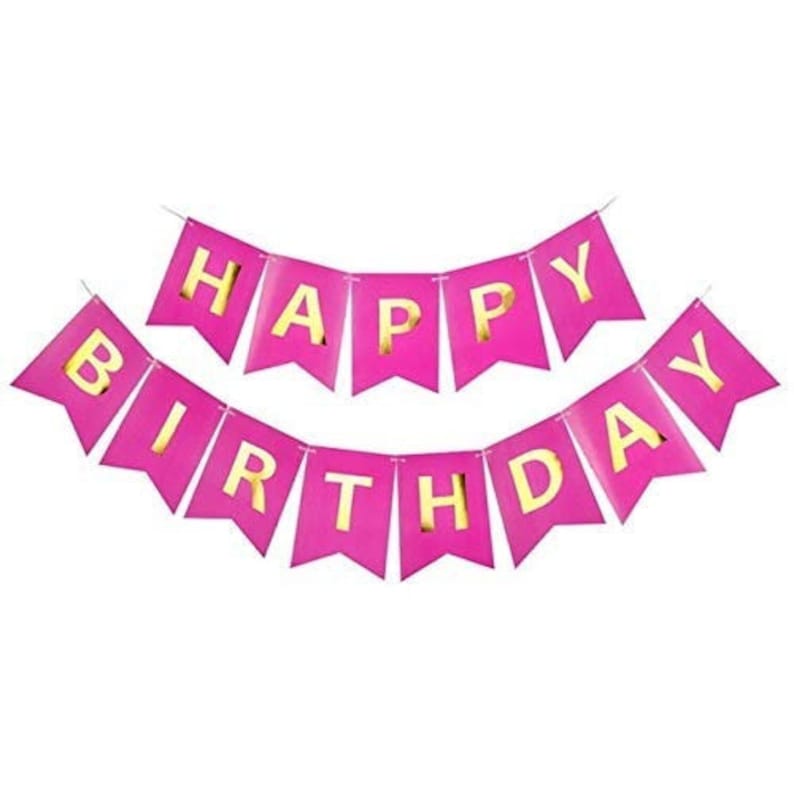 May include: A pink banner with gold lettering that reads "HAPPY BIRTHDAY". The banner is made of individual pennants strung together. The background is white.