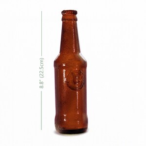 Handmade edible sugar beer bottles in brown and green colours by EdiBottle – luxury cake toppers made in the UK.