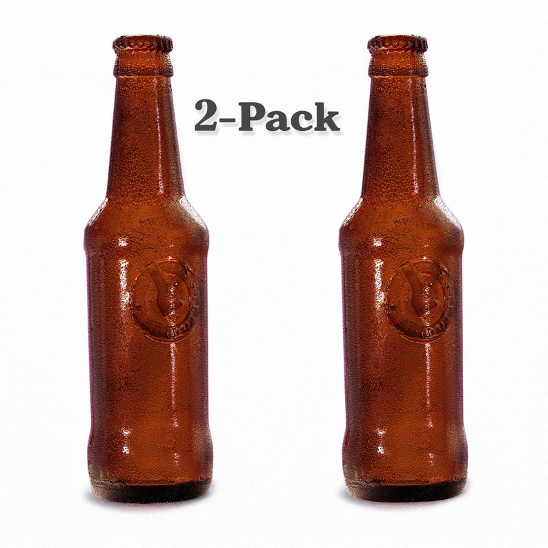 Handmade edible sugar beer bottles in brown and green colours by EdiBottle – luxury cake toppers made in the UK.