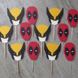 May include: A set of 12 superhero cupcake toppers featuring Wolverine and Deadpool. The toppers are made of cardstock and have a yellow, black, red, and white colour scheme.