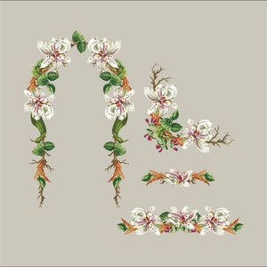 May include: A set of four floral arrangements featuring white flowers with pink accents. The arrangements are in the shape of a horseshoe, a crescent moon, and two horizontal lines.