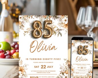 Peut inclure: Une invitation de 85e anniversaire sur le thème floral avec des chiffres en feuille d'or et le nom Olivia. L'invitation comprend la date, l'heure et le lieu de l'événement. Les informations RSVP sont également incluses.