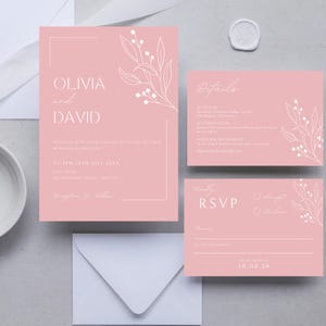 May include: Pink wedding invitation suite with white floral illustrations and the text "Olivia and David" and "RSVP".