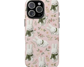 Conejitos caprichosos y estampado floral sobre fondo rosa.