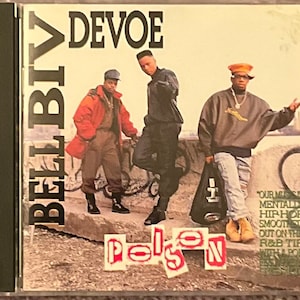 May include: A CD cover for the album "Poison" by Bell Biv DeVoe. The cover features three men in casual clothing standing on a concrete surface. The album title is written in large, bold letters in the center of the cover. The album title is written in a stylized font with a red, white, and blue color scheme. The album title is surrounded by a black and white graphic design.