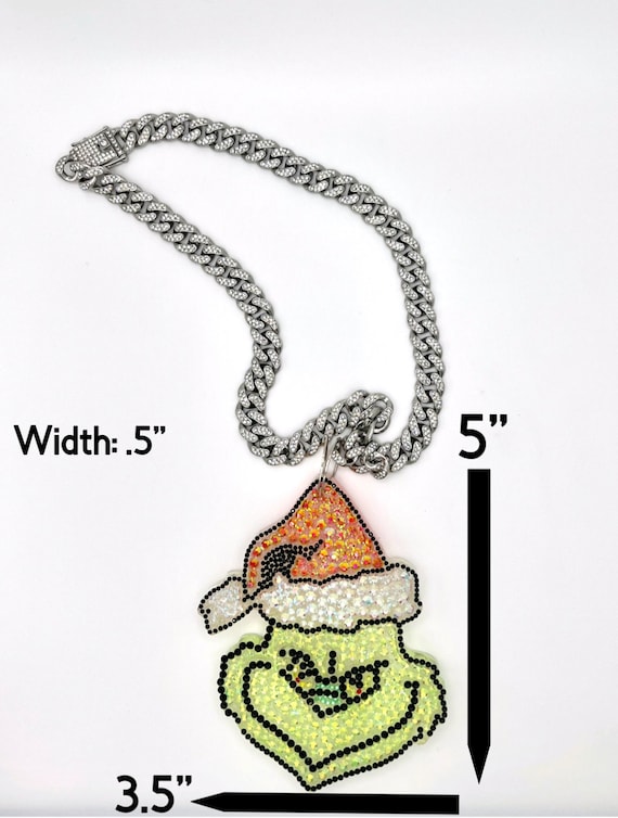 Dr. Seuss™ The Grinch Santa Necklace & Earrings Set | Claire's US