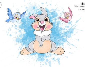 May include: A watercolour illustration of a cute grey bunny rabbit with pink cheeks and a blue and pink watercolour background. The bunny is sitting with its paws crossed and looking up. There are two birds flying around the bunny, one blue and one pink.