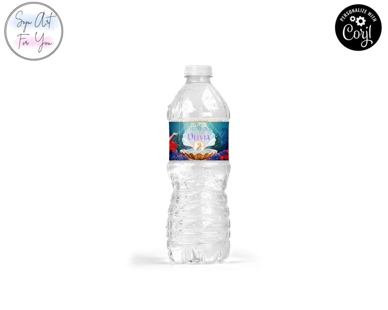 May include: A clear plastic water bottle with a white cap. The label features a mermaid theme with the name "Olivia" and the number "2". The label has a blue, teal, and gold color scheme.
