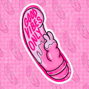May include: Pink sticker with a dripping, cartoon hand giving the peace sign. The sticker says "Good Vibes Only" in pink letters.