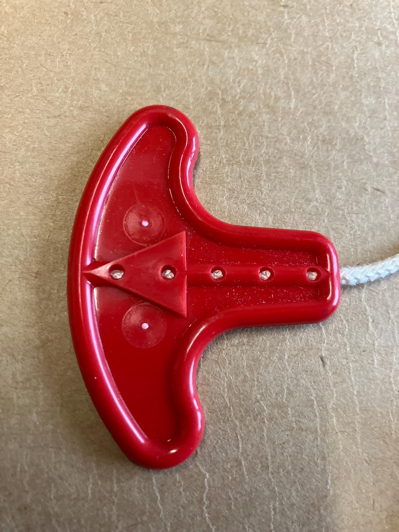 Keychain, life jacket, keychain made from an authentic life vest inflation pull. image 2