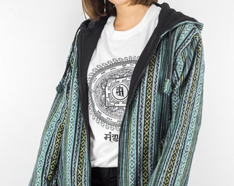 Chaqueta polar hippie Gheri color turquesa. Tejido tradicional nepalí. Chaquetas hippies unisex hechas a mano éticamente en Himanepal.
