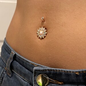 Flower belly button piercing in rose gold for a special appearance image 5